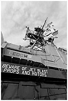Island and flags,  USS Midway aircraft carrier. San Diego, California, USA ( black and white)