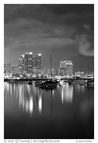 Yachts and skyline from Harbor Drive, at night. San Diego, California, USA