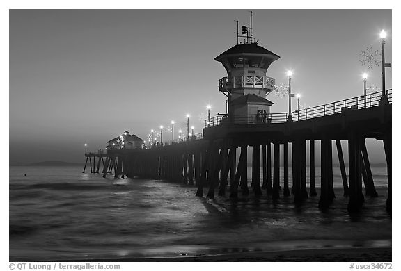 Huntington Pier lights at twilight. Huntington Beach, Orange County, California, USA