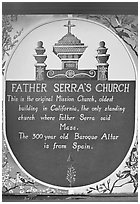 Sign explaining historical significance of Serra Chapel. San Juan Capistrano, Orange County, California, USA (black and white)