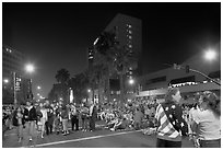 Families waiting for fireworks on Almaden street, Independence Day. San Jose, California, USA (black and white)