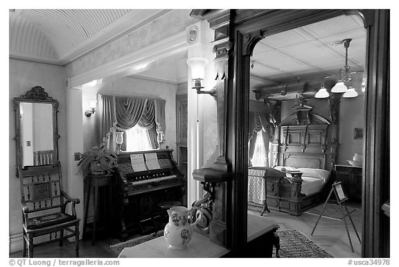 Mirror and last bedroom of Sarah Winchester. Winchester Mystery House, San Jose, California, USA (black and white)