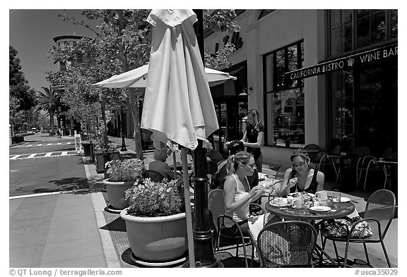 Street and outdoor restaurant tables. Santana Row, San Jose, California, USA