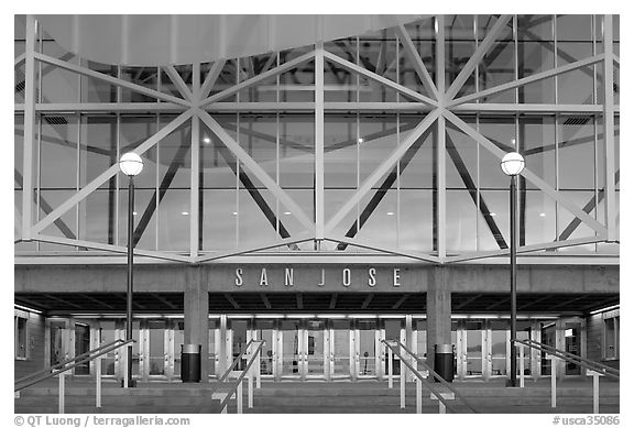 Facade of HP pavilion with San Jose sign reflecting sunset colors. San Jose, California, USA (black and white)
