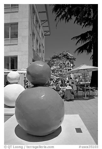 Sculpture  and outdoor restaurant terrace, Castro Street, Mountain View. California, USA (black and white)
