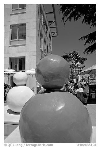 Sculptures and outdoor lunch, Castro Street, Mountain View. California, USA (black and white)