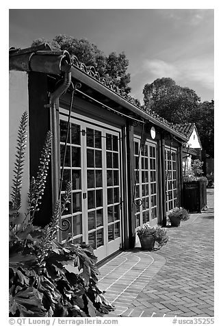 European-style glass doors and brick pavement, Allied Arts Guild. Menlo Park,  California, USA (black and white)