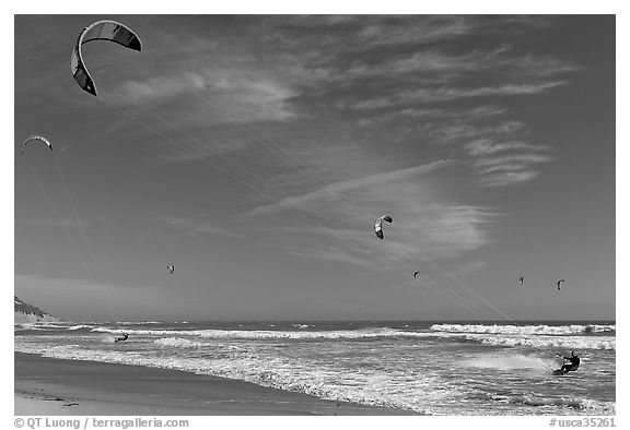 Kite surfers and coastline, Waddell Creek Beach. California, USA