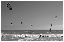 Kite surfing and wind surfing, Waddell Creek Beach. California, USA ( black and white)
