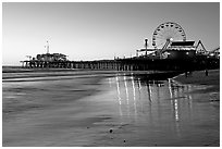 Pier and Ferris Wheel at sunset. Santa Monica, Los Angeles, California, USA ( black and white)