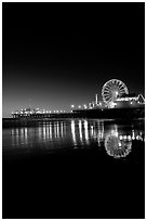 Ferris Wheel and pier at night. Santa Monica, Los Angeles, California, USA ( black and white)