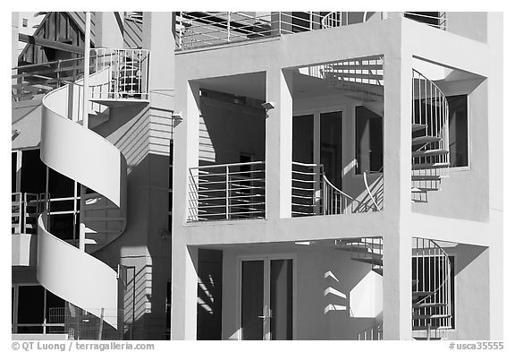 Facade of beach houses with spiral staircase. Santa Monica, Los Angeles, California, USA (black and white)