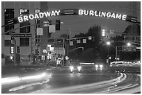Broadway at night with lights from moving cars. Burlingame,  California, USA ( black and white)