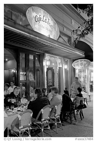 Italian restaurant with diners by night. Burlingame,  California, USA (black and white)