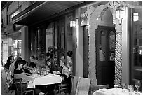 Outdoor table of Italian restaurant at night. Burlingame,  California, USA (black and white)