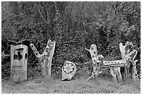 Wood carvings in garden. Half Moon Bay, California, USA ( black and white)