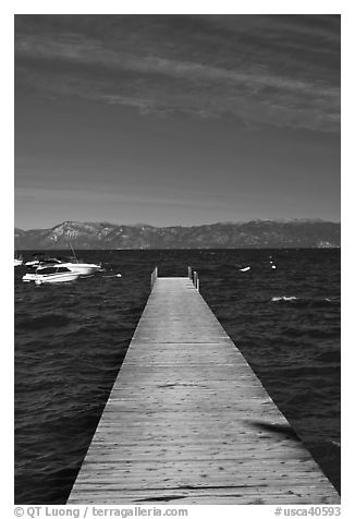 Dock, small boats, and blue waters, West shore, Lake Tahoe, California. USA (black and white)