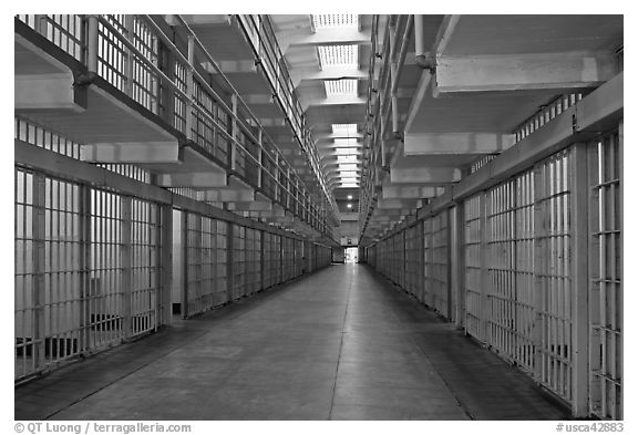 Row of prison cells, main block, Alcatraz prison interior. San Francisco, California, USA (black and white)