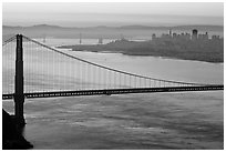 Golden Gate Bridge, San Francisco, and Bay Bridge at dawn. San Francisco, California, USA (black and white)