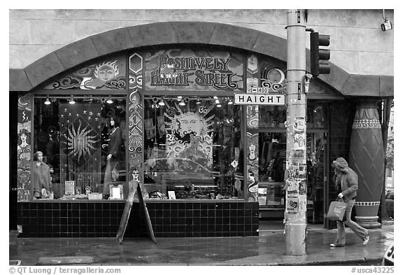 Rainny sidewalk and store with psychadelic colors. San Francisco, California, USA (black and white)