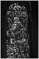 Stained glass window with Einstein figure and famous energy equation, Grace Cathedral. San Francisco, California, USA (black and white)