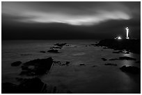 Night coastal scene with ocean and Lighthouse, Point Arena. California, USA ( black and white)