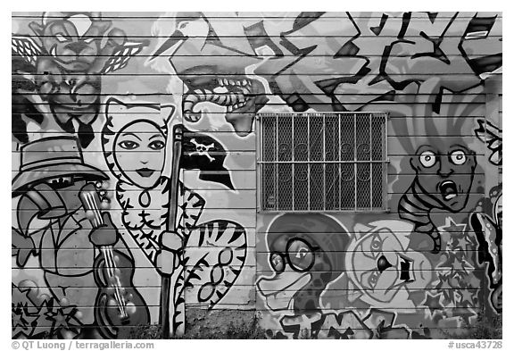 Painted wall and window, Mission District. San Francisco, California, USA (black and white)