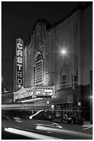 Light blurs and Castro Theater at night. San Francisco, California, USA (black and white)