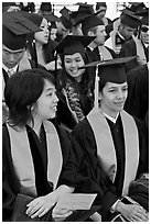 Students in academical dress sitting during graduation ceremony. Stanford University, California, USA (black and white)