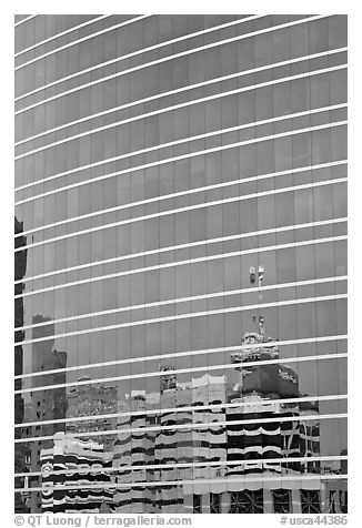 Federal building reflected in glass facade. Oakland, California, USA (black and white)