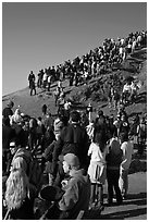 Spectators on bluff during mavericks contest. Half Moon Bay, California, USA (black and white)