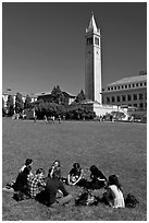 Students on lawn with Campanile in background. Berkeley, California, USA (black and white)