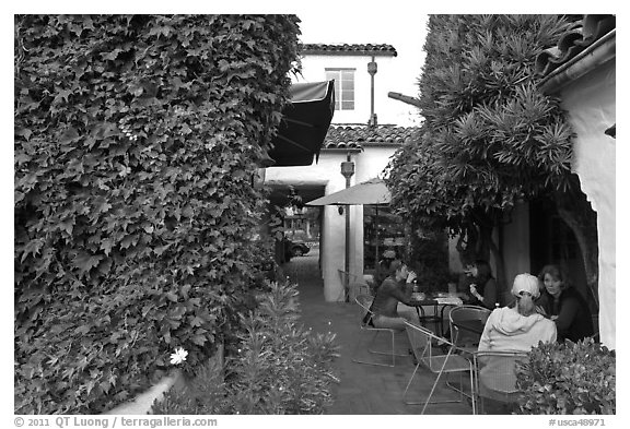 Cafe terrace in alley. Carmel-by-the-Sea, California, USA