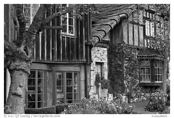 Old wooden houses used as art galleries. Carmel-by-the-Sea, California, USA (black and white)