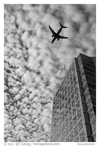Adobe Tower and commercial aircraft. San Jose, California, USA (black and white)