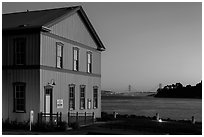 Tiburon Road-Ferry museum and Golden Gate Bridge at sunset. California, USA (black and white)