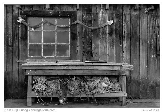 Shed with fishing gear and Chinese dragon, China Camp State Park. San Pablo Bay, California, USA (black and white)