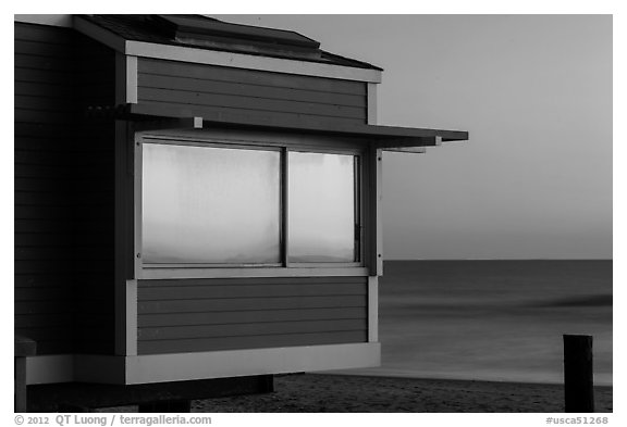 Sunset reflected in beach house window, Stinson Beach. California, USA (black and white)