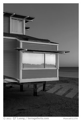 Contemporary beach house at dusk, sunset reflection, Stinson Beach. California, USA (black and white)