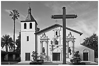 Cross and Mission Santa Clara de Asis, early morning. Santa Clara,  California, USA ( black and white)
