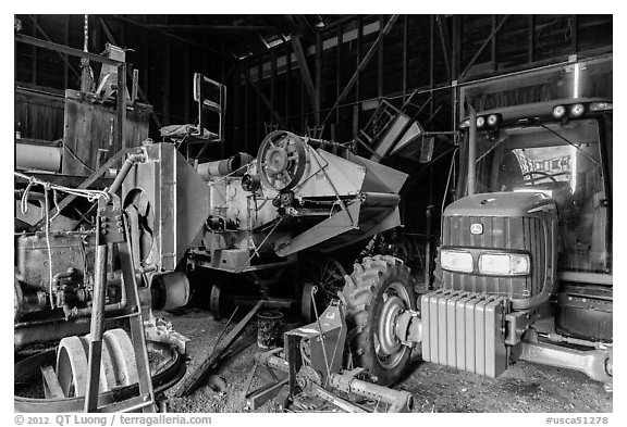 Barn full of agricultural machinery, Ardenwood farm, Fremont. California, USA (black and white)
