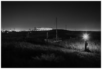 Marsh by night with office building in distance, Alviso. San Jose, California, USA (black and white)