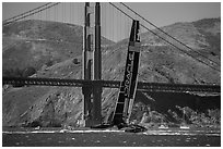 Oracle Team USA defender America's cup boat and Golden Gate Bridge. San Francisco, California, USA (black and white)