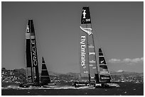 New Zealand boat leading USA boat on first downwind leg of decisive race. San Francisco, California, USA (black and white)