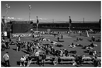 Synthetic lawn and giant screen, America's Cup Park. San Francisco, California, USA (black and white)
