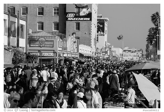 Ocean Front Walk with throngs of people. Venice, Los Angeles, California, USA (black and white)