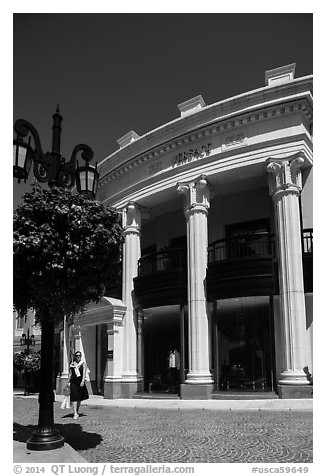 Woman shops near Rodeo Drive. Beverly Hills, Los Angeles, California, USA (black and white)
