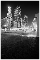 Fountain and high-rises at night, Pershing Square. Los Angeles, California, USA ( black and white)