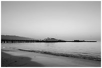 Beach and Stearns Wharff and sunset. Santa Barbara, California, USA ( black and white)