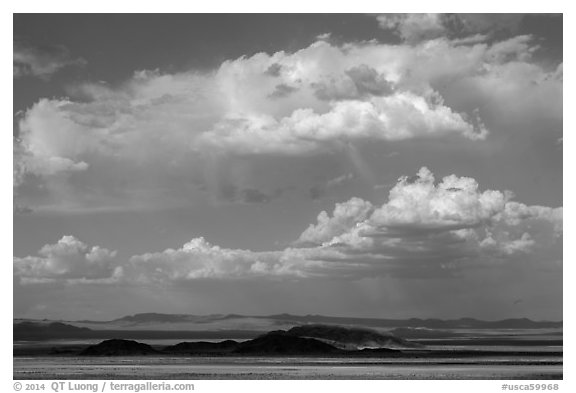 Clouds above desert mountains. California, USA (black and white)